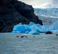 Kayakers in Lago Grey and the Grey Glacier